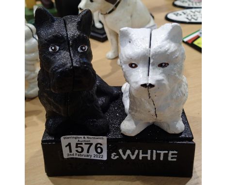 Cast iron black and white Scotch whiskey pun promotional ornament, H: 12 cm. P&amp;P Group 2 (£18+VAT for the first lot and £