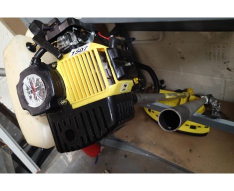 Unbranded petrol multitool with chainsaw (lacking chain), hedge trimmer and bush cutter attachment. Not available for in-hous