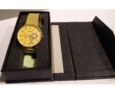 Lige; gents wristwatch with champagne dial, gold body and gold mesh strap, new in box, working at lotting. P&amp;P Group 1 (£