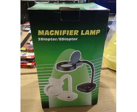 New old stock boxed magnifying lamp. P&amp;P Group 2 (£18+VAT for the first lot and £3+VAT for subsequent lots) 