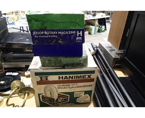 Hanimex slide projector and four slide magazines. Not available for in-house P&amp;P, contact Paul O'Hea at Mailboxes on 0192