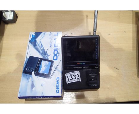 Casio TV-3100 LCD pocket colour television. P&amp;P Group 2 (£18+VAT for the first lot and £3+VAT for subsequent lots) 