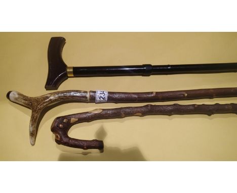 Two wooden crooks, one with antler top and one collapsible walking stick. P&amp;P Group 3 (£25+VAT for the first lot and £5+V