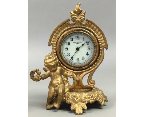 19TH CENTURY TIMEPIECE,the dial inscribed New Haven, USA, 16cm high, along with a Seiko Quartz mantel clock (2)