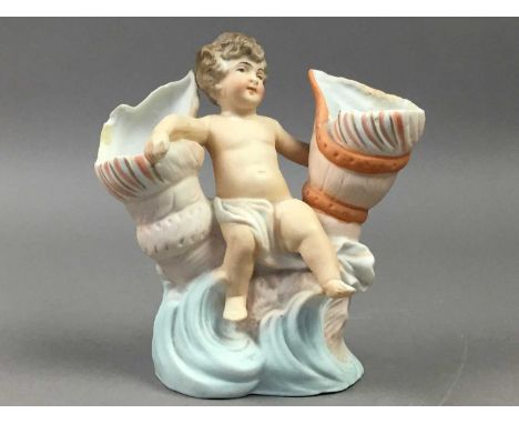 GROUP OF GERMAN BISQUE 'PIANO' BABIES,along with two cherub figures (6)One of the figures has a patch of restoration/appears 