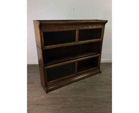 OAK SECTIONAL BOOKCASE,with three double width stacking sectionsMiddle section missing oak framed glazed panels&nbsp; Lower s