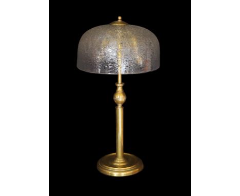 A 1960s German brass table lamp with crackle effect glass shade, height 57cm
***CONDITION REPORT***Minor oxidisation commensu