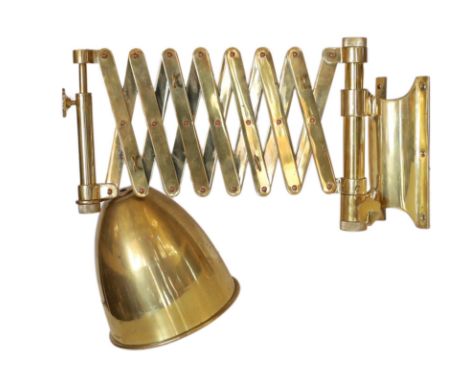 An early 20th century style black and brass expanding wall light, height 34cm
***CONDITION REPORT***Light oxidisation, requir