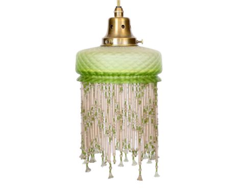 A 1920s French quilted glass light fitting with beaded fringe, height 30cm. width 15cm
***CONDITION REPORT***Good condition, 