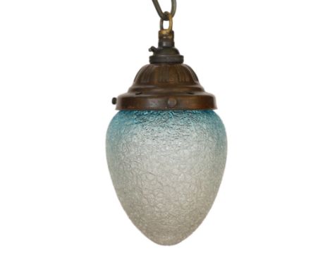 A 1920's English bronzed metal light pendant with blue tinted frosted glass shade, height 22cm
***CONDITION REPORT***Very goo