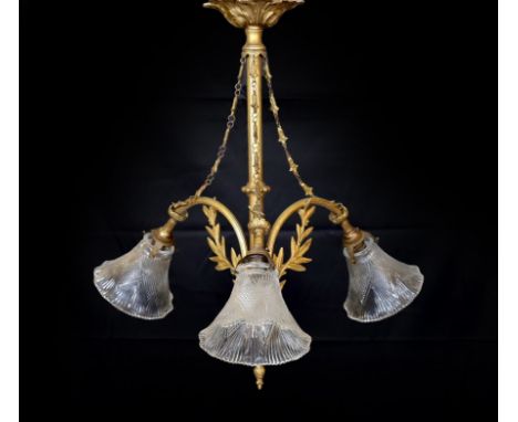 A 20th century French gilt brass three light chandelier with cut glass shades, height 60cm. width 60cm
***CONDITION REPORT***
