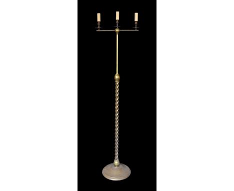 A lacquered brass three light lamp standard, with spiral fluted column and simulated candlestick sconces, height 172cm
***CON