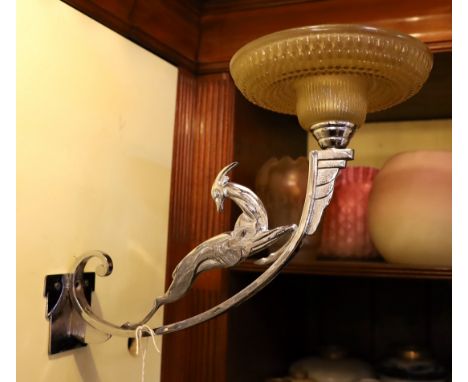 A French Art Deco nickel plated wall light with moulded glass shade and antelope stem, height 30cm. depth 35cm
***CONDITION R