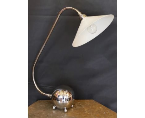 A stylish nickel plated desk lamp, with conical opaque white glass shade and loaded spherical base, height 52cm
***CONDITION 