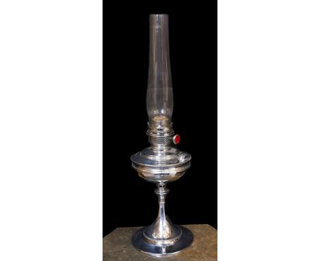 A 1930s nickel plated oil lamp with plain glass flue, height overall 68cm
***CONDITION REPORT***Very good condition
&nbsp;
