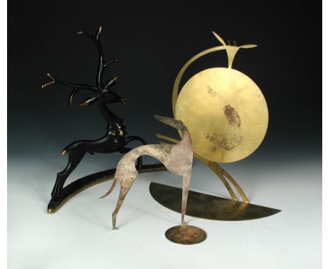 A Hagenauer brass gong, modelled as a stylised giraffe, stamped marks, together with a Hagenauer style silvered model of a gr