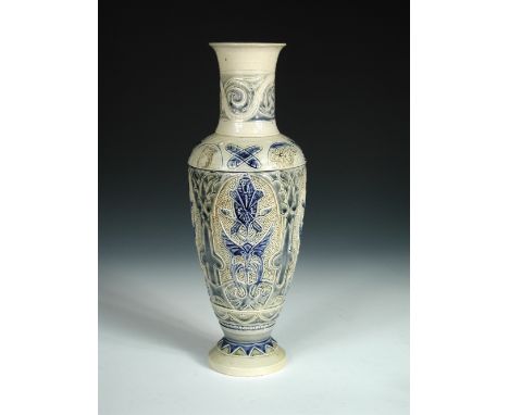 A C.J.C. Bailey Fulham stoneware vase by Edgar Kettle, the shoulder incised with goats and figures, the body with foliate mot