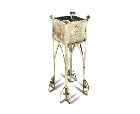 A Glasgow School painted copper and wrought iron planter on stand, the square planter of copper panels embossed with stylised