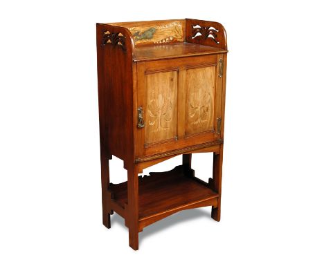 An Art Nouveau mahogany side cabinet, the galleried top with pierced sides, the back inlaid and painted with fish and foliage