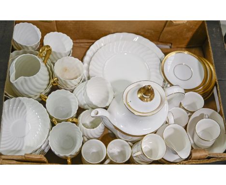 A Royal Doulton bone china Royal Gold H4980 part coffee service and a Bisto bone china spiral fluted part tea and dinner serv