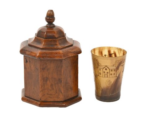 A George III walnut octagonal tea caddy and cover, with acorn finial, 19cm h and a contemporary horn beaker, engraved with sc