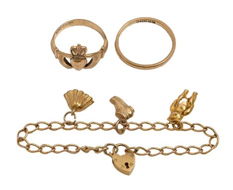 A 9ct gold wedding ring and a 9ct gold Claddagh ring, and a 9ct gold charm bracelet and padlock, 9.1g, ring sizes O, R (3)  T