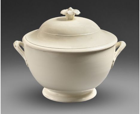 A Thuringian creamware soup tureen and cover, 19th c, with flower finial, 28cm h, impressed Reichenbach  Minor crack at base 