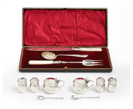 A George V silver condiment set, blue glass liners, mustard pot 40mm h, by W Wilkinson Ltd, Birmingham 1932 and 1933, 2oz 13d