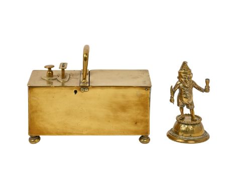 A Victorian brass tavern tobacco honesty box, mid 19th c, 24cm l and a Victorian cast brass Punch figural table lighter, on d
