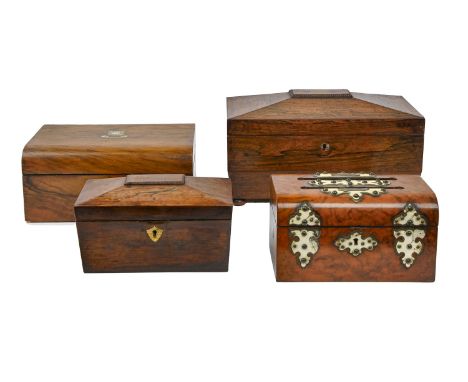 A Victorian rosewood sarcophagus-shaped tea chest, on bun feet, fitted interior with twin-lidded compartment and cut glass mi