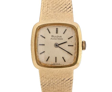 A Bulova 18ct gold cushion shaped lady's wristwatch, Accutron, 21 x 23mm, on 18ct tapered mesh bracelet with maker's clasp, i