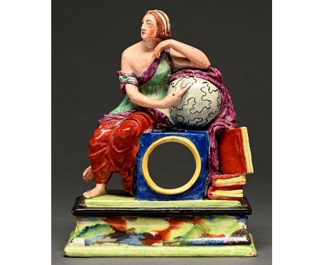 A Staffordshire pearlware watch stand modelled with a classical woman as the Goddess of Truth or Urania, the muse of Astronom