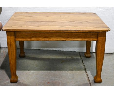 A mid-century oak dining table, with ash top, square tapering legs and flared feet, 70cm h; 121 x 90cm  Light scratches to to