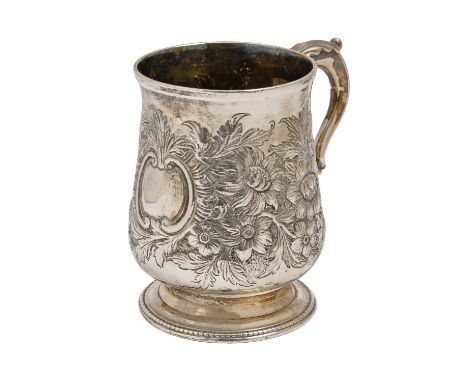 A George III silver mug, later chased, 10cm h, by Charles Bright, London 1779, 8oz 5dwt  Good condition with only light wear,