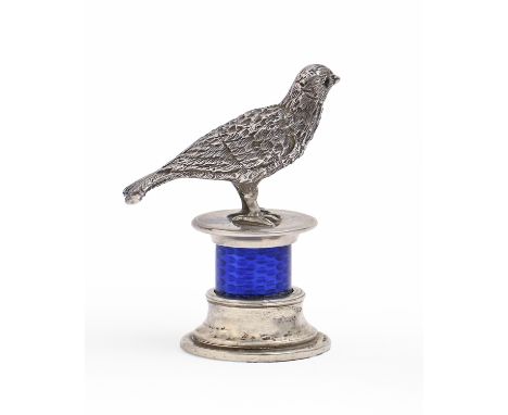 A silver and blue guilloche enamel standing seal, cast in the form of a bird on a plinth, c1900, engraved monogram, 37mm h, f
