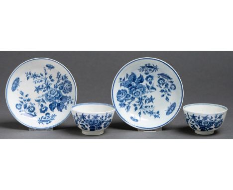A pair of Worcester tea bowls and saucers, c1780, transfer printed in underglaze blue with the Three Flowers pattern, 12cm di