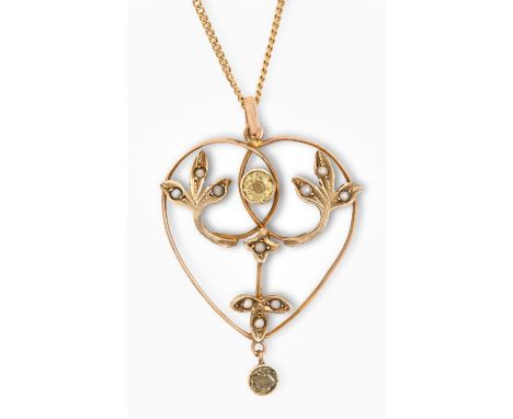 An Edwardian peridot and split pearl openwork pendant, in gold, 36mm h, marked 9ct, on a gold necklet, 3.8g  Good condition