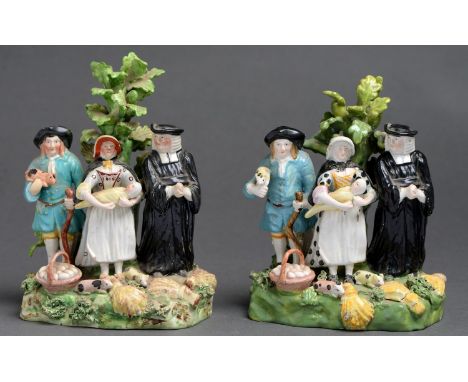Two Staffordshire pearlware tithe pig groups, early 19th c,&nbsp;painted in overglaze enamels, before bocage, 17cm h  Some mi