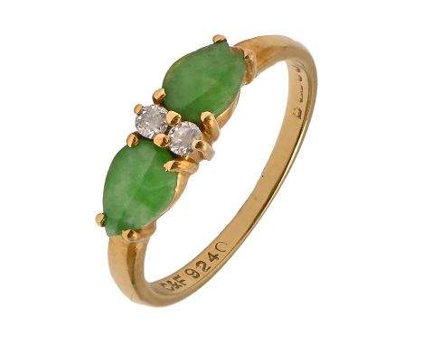 A jade and diamond ring, in 18ct gold, marks rubbed, London 1984, 2g, size I  Point of one of the two jades chipped