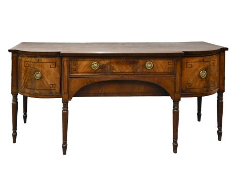A George III inlaid mahogany breakfront sideboard, on ring turned legs, drawers with brass handles, 93cm h; 214 x 74cm  Top s