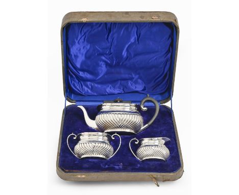 A George V silver tea service, with gadrooned rim, teapot 13.5cm h, by Harrison Bros &amp; Howson, London and Sheffield, 1913