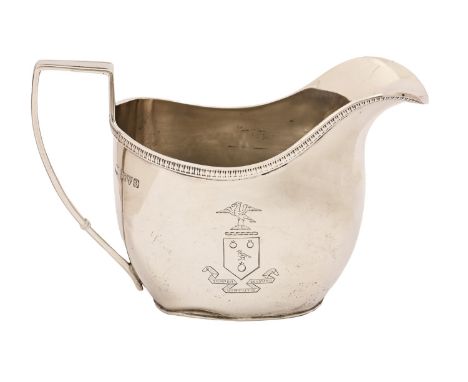 A George V silver cream jug, crested, 85mm h, maker's mark rubbed, Chester 1929, 3oz 17dwt  Light wear