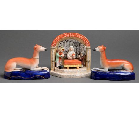 A pair of Staffordshire earthenware greyhounds 19th c, on blue gilt lined platform with inkwell and a reproduction Arbour gro