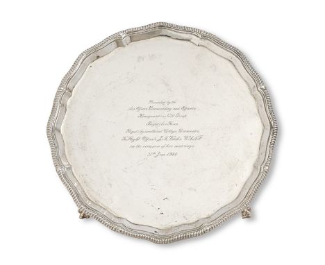 An Elizabeth II silver salver, on four feet, 25.5cm diam, by Thomas Bradbury &amp; Sons Ltd, Sheffield 1967, 20oz 10dwt  Ligh