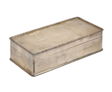 An Elizabeth II silver cigarette box, engine turned, 19cm l, by A Wilcox, Birmingham 1955, 17oz 18dwt  Good condition, no den