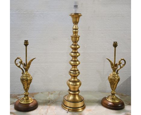 A pair of antique style giltmetal ewers, mounted as table lamps, 45cm h and another giltwood and composition table lamp, in t