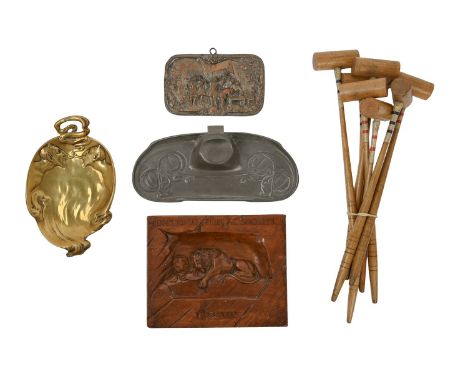 An English Art Nouveau pewter desk stand, 22.5cm w, the base with impressed maker's marks and registration No 0404P, a brass 