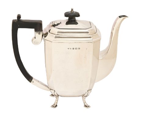 A George V silver teapot, 19cm h, maker's mark rubbed, Birmingham 1931, 23oz  Light wear and minor dent