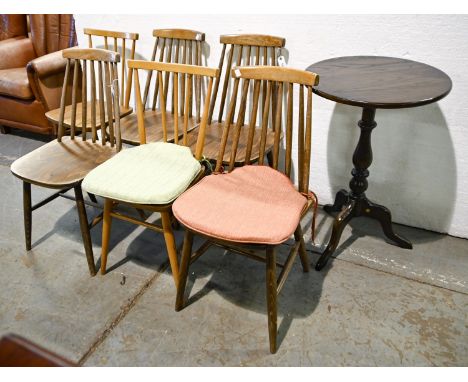 An Ercol 1106 TR dark stained tripod table, 76cm h, a set of four mid-century ash spindle back kitchen chairs and a similar E