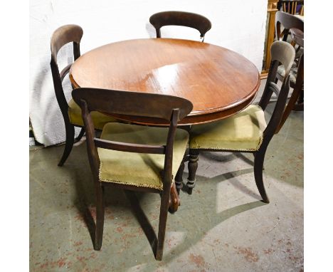 A Victorian mahogany breakfast table, on carved tripod base, 74 x 103cm and a set of four contemporary dining chairs  
